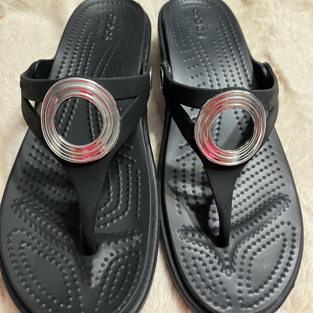 Crocs Stylish Black Sandals with Silver Accents